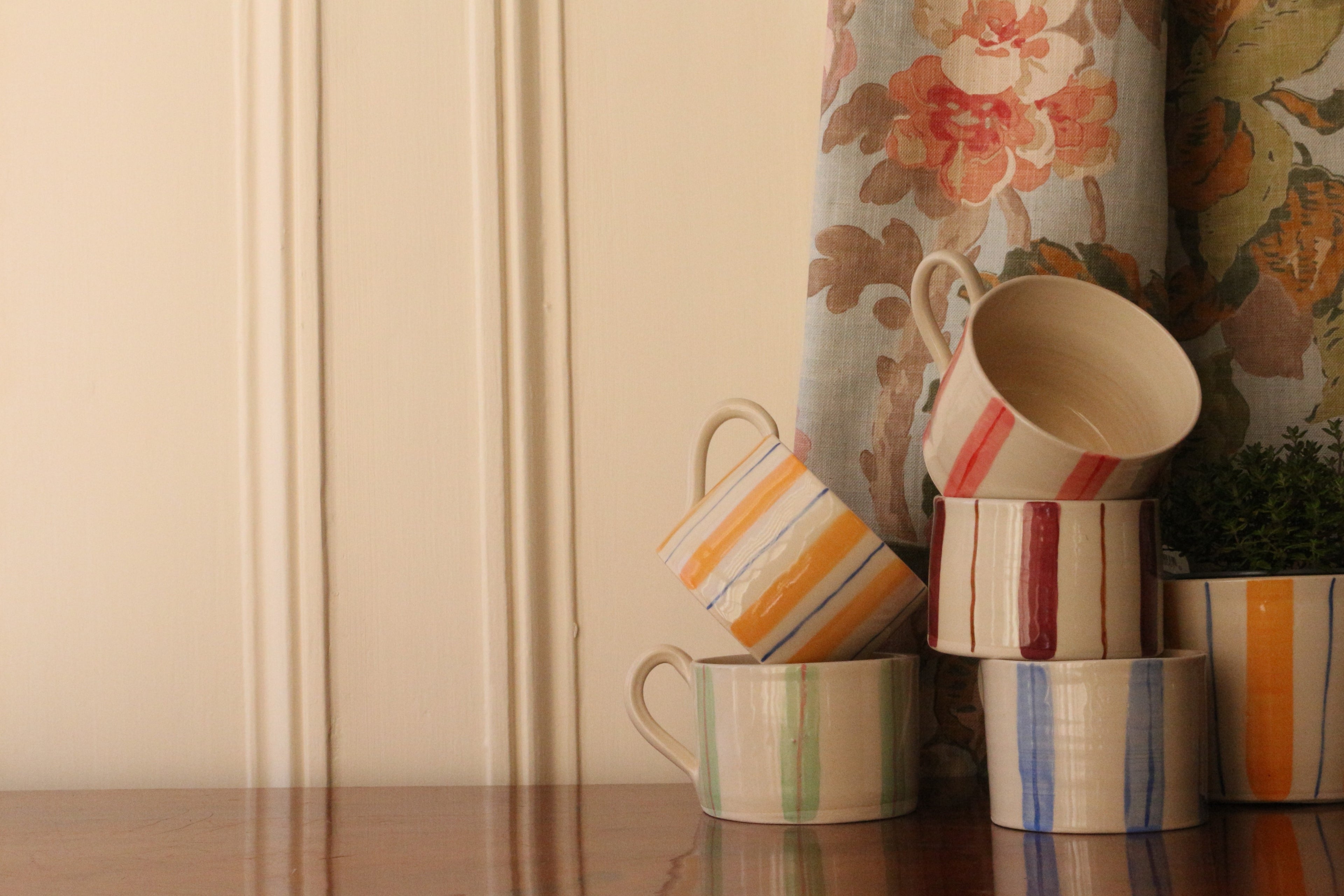 Selection of striped mugs by Jessie Morrison Ceramics